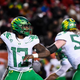 Oregon quarterback Anthony Brown looks for a pass during the first half of a game against Utah Saturday.